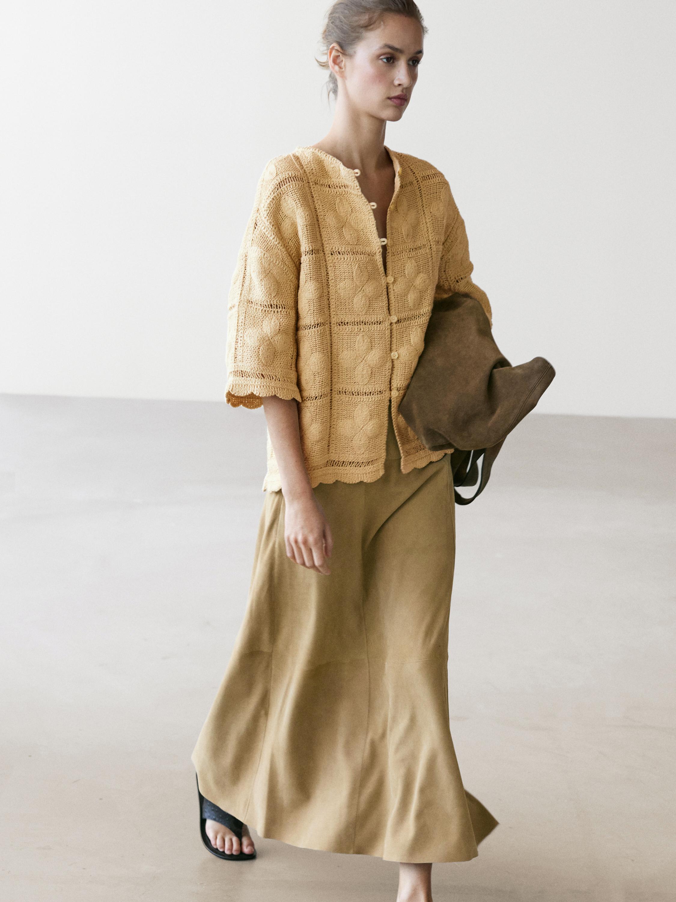 Veste en maille ajourée et crochet